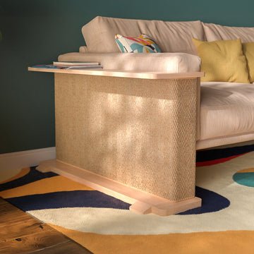 Plywood vs solid wood cat furniture: maple-finish CozeCat Side Table with a sisal side next to a beige sofa